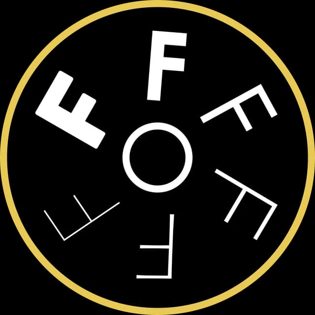 The round emblem of Figaro Era: six F's in a circle, set in a gold ring